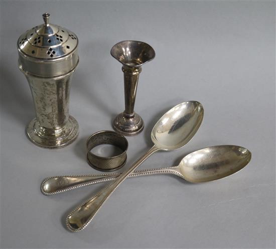 A 1930s Art Deco silver sugar sifter by Joseph Gloster Ltd, Birmingham, 1936, two spoons, vase and napkin ring.